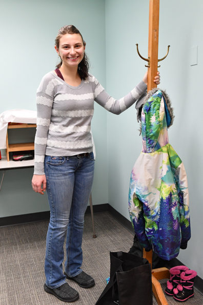 Jenna Cavena and the winter day testing set up in the WSU Childhood Cognition Laboratory