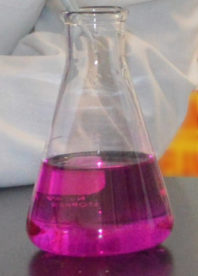 close up of liquid in a tapered beaker