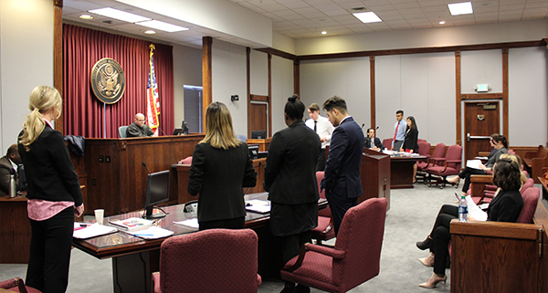 Students engaged in a mock trial.