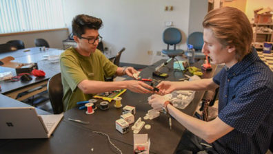 Students working at a table.
