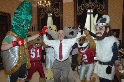 State Treasurer Mike Murphy rallies in his office with public higher education mascots.