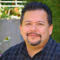 WSU Graduate Assistant Dean Raymond Herrera