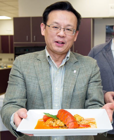 WSU Regents Professor Juming Tang serving up the results of new food safety technology.