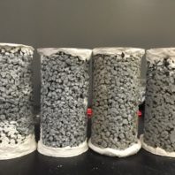 Core samples of permeable pavement. Researchers are working to use fly ash from coal plants for environmentally friendly concrete.