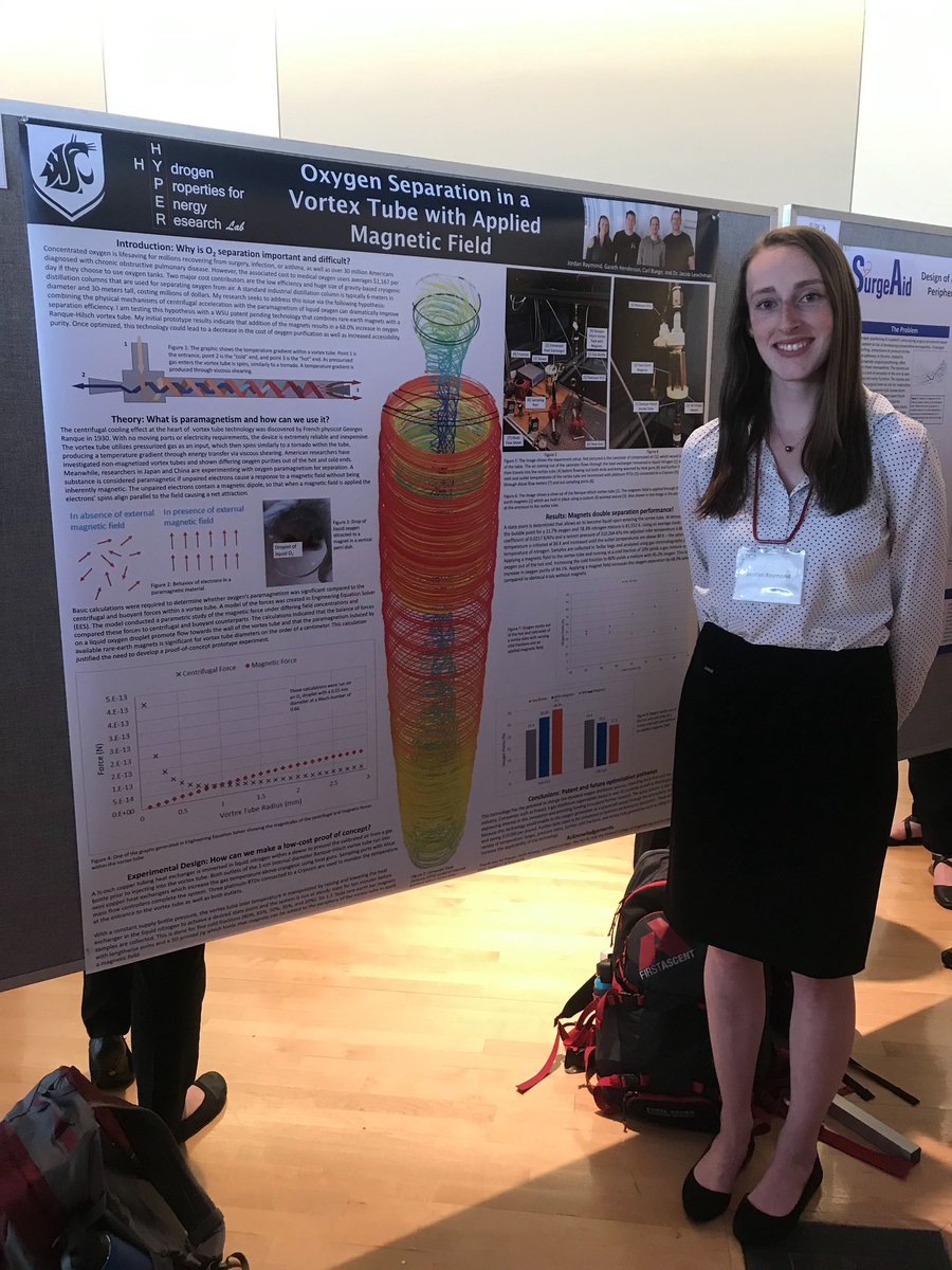 Jordan Raymond stands next to a poster display titled Oxygen Separation in a Vortex Tube with Applied Magnetic Field.
