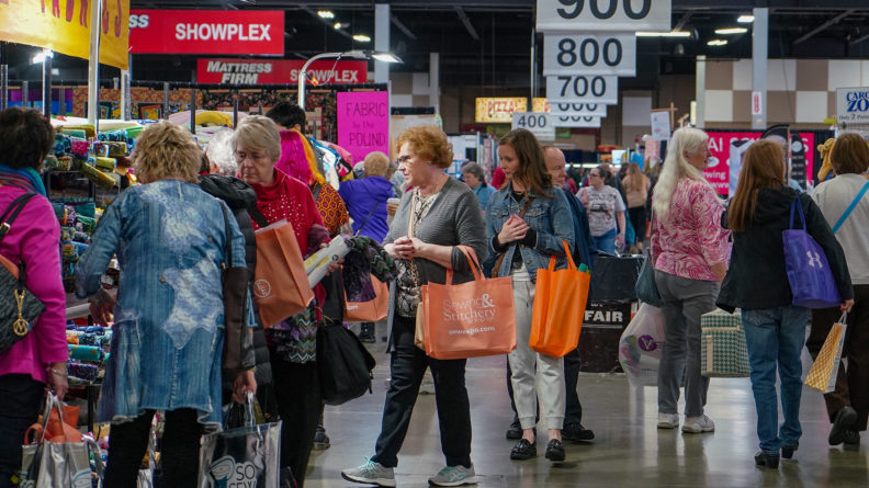 Shoppers stay busy on the show floor during the 2020 Expo.