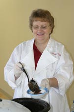 Dory Birch serves cricket chili