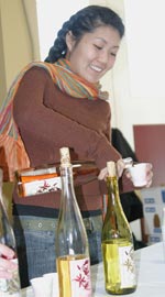 Judy Wu, entomology grad student, serves mead