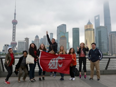 Students show their Coug flag on Shanghai’s famous Bund waterfront, with views of Pudong’s skyscrapers. From left are Yeseily Pruneda, Tatiana Sweat, Nikki Norman, Ariana Paynter, Katie Rae, Alison DePhillips, Graciela Vela, Kaitlyn Jo Engle, and Assistant Professor Ting Chi.