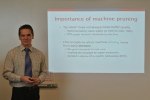 Chris Jenkins gives his thesis defense to earn his masters degree in food science.