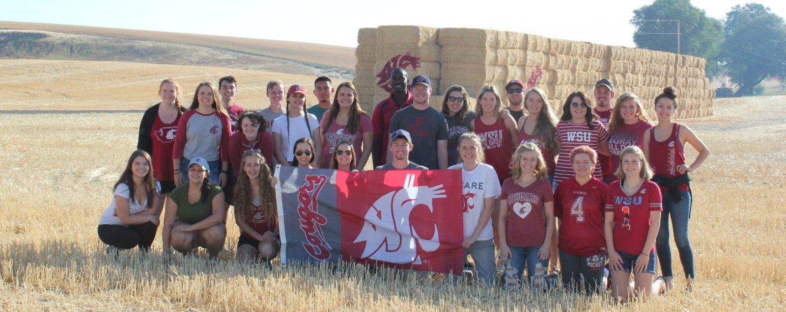 CAHNRS Ambassadors with WSU Flag