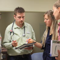 Mike Burdette talking with students.