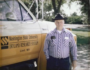 Dr. Edwin Donaldson standing in front of a truck