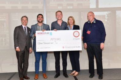 team with award check