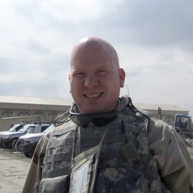 Mike Edwards in military arttire in Afghanistan.