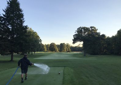 Devan Harke watering tee box.
