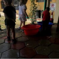 kids outside on a covered patio