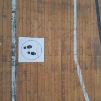 stand here sign on the floor