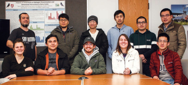 Group photo of eleven graduate students
