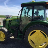 A picture of a 5100 M John Deere tractor.