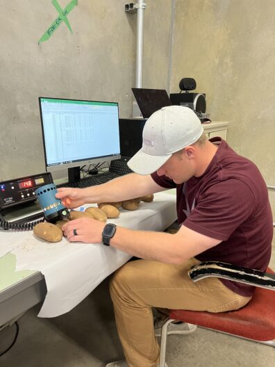 A picture of a student using a photovolt machine.