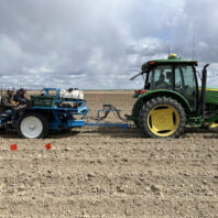 A picture of a two row potato planter.