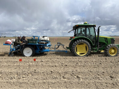 A picture of a two row potato planter.