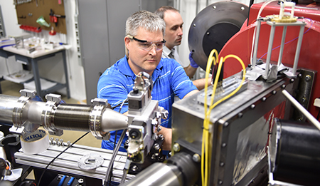 Stefan Turneaure, first author, prepares the target chamber for a shotDynamic Compression Sector at Argonne National Labs Advanced Photon Source.