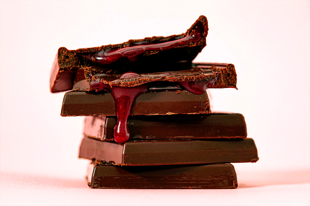 Stack of cherry-filled chocolate squares.