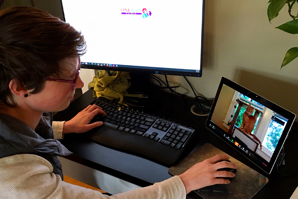 Closeup of Katie Kuehl at a computer workstation.