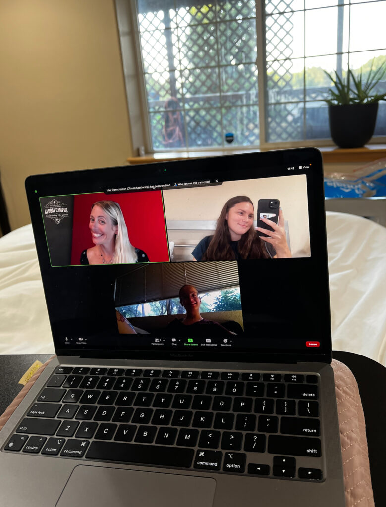 A laptop displaying a WSU Global Campus Zoom session.