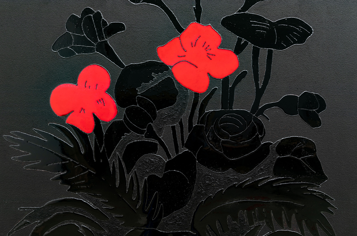 Black and red painting by Juventino Aranda depicting flowers.