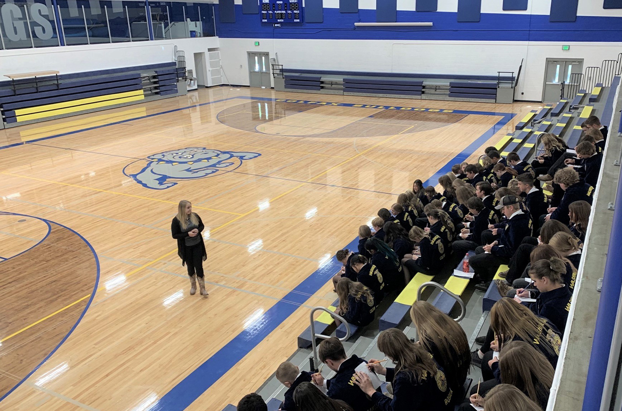 Kaitlyn Wright speaks to students at Colfax High School