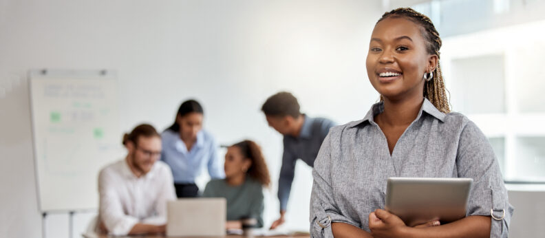 Young woman holding tablet