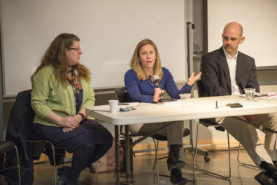 A panel of three people