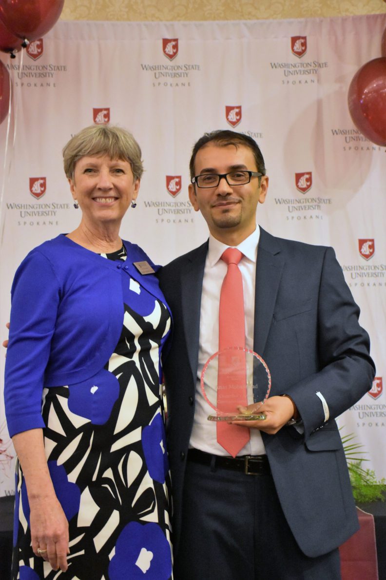 Assistant Dean Jo Ann Dotson, left, with Anas Mohammad, right. 