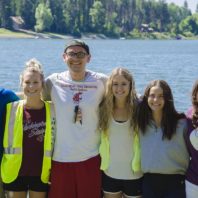 Group of nursing students standing arm in arm at Camp Stix.
