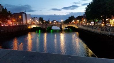 Nightime shot of a bridge over the River Liffey in Dublin.