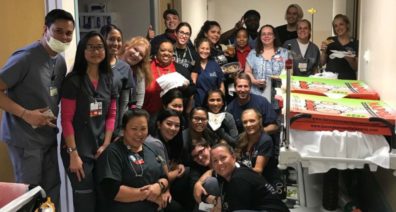 Staff at Sunrise Hospital in Las Vegas took a picture with the pizzas sent by ER staff at Providence Sacred Heart Medical Center in Spokane.