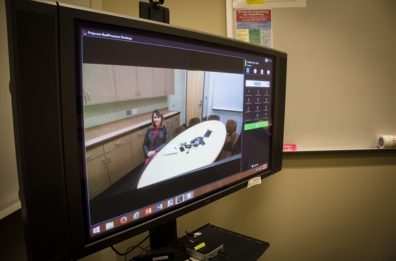 Dr. Wendy Buenzli of the WSU College of Nursing talked about continuing education during an event with WSU Extension in Island County; here she's shown on a monitor used to link up the Spokane campus with the office on Whidbey Island.