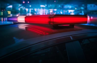 Stock photo of police car lights at night