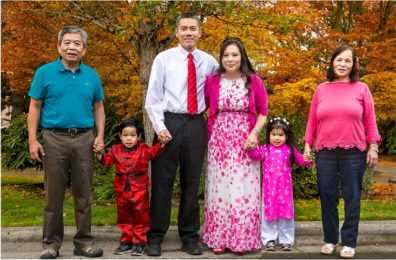 Family portrait of Connie Nguyen-Truong with father, mother, kids, husband.