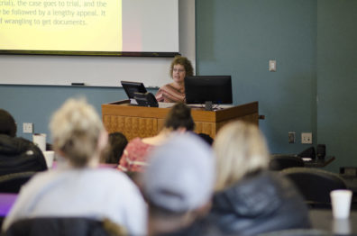 Naomi Lungstrom at the front of a classroom.