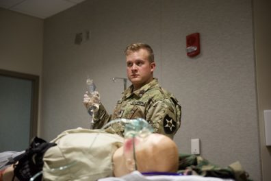 army specialist with IV bag