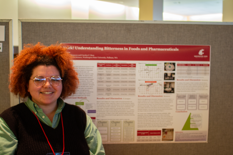 Hallie Simpson in front of her poster.