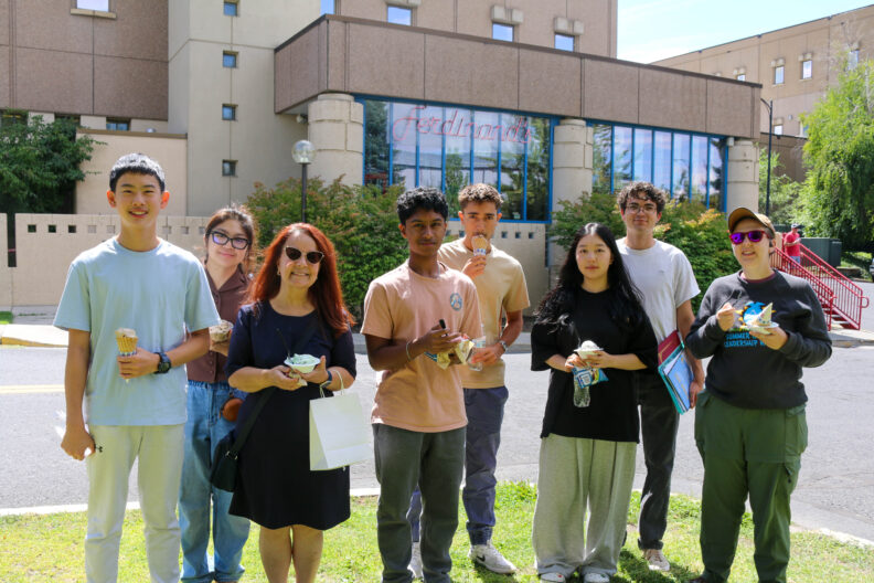 Dr. Unlu, her grad students, and participating students outside of Ferdinand's.