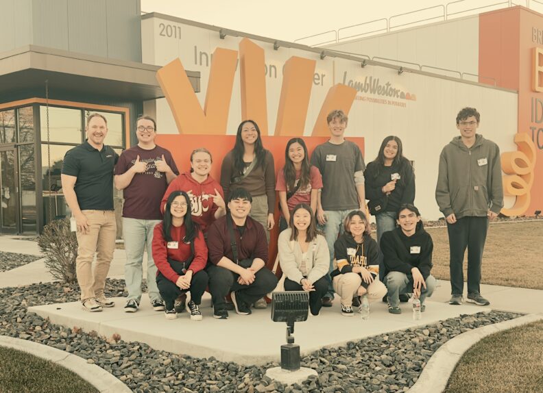 A group of food science students outside of a LambWeston building.