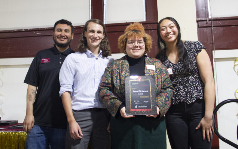 Four food science students, including Natalie, receive an award for Superior Club.
