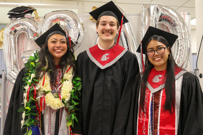 The three graduating undergrads standing together.