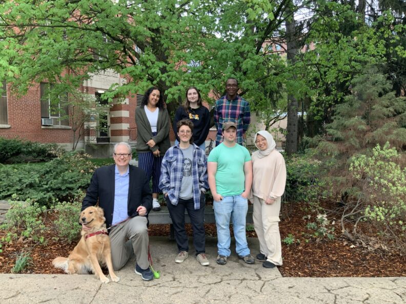 A group photo with 6 graduate students.